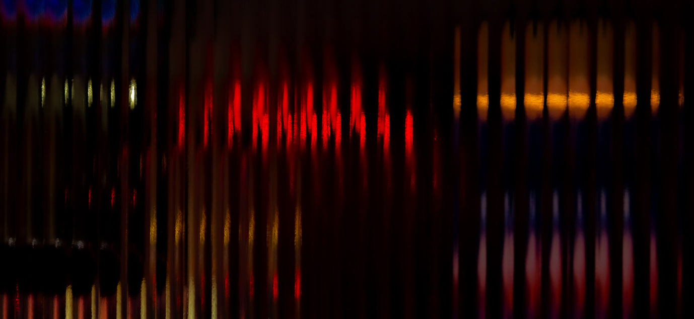 Close-up detail of Diorama II by Bastiaan van Ederen, showing urban light and distant movement transformed through fluted glass.