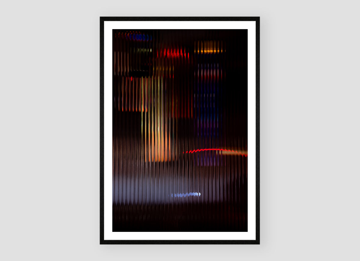Diorama II by Bastiaan van Ederen, a photographic artwork transforming urban light and distant movement through fluted glass.