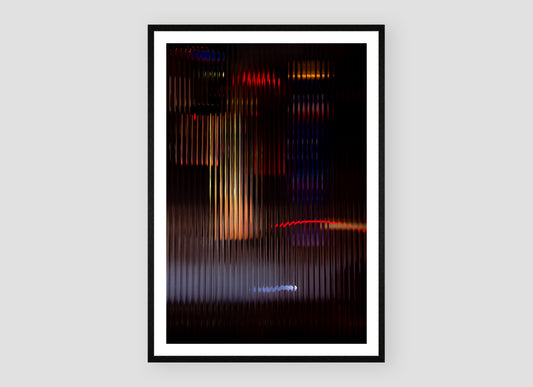 Diorama II by Bastiaan van Ederen, a photographic artwork transforming urban light and distant movement through fluted glass.