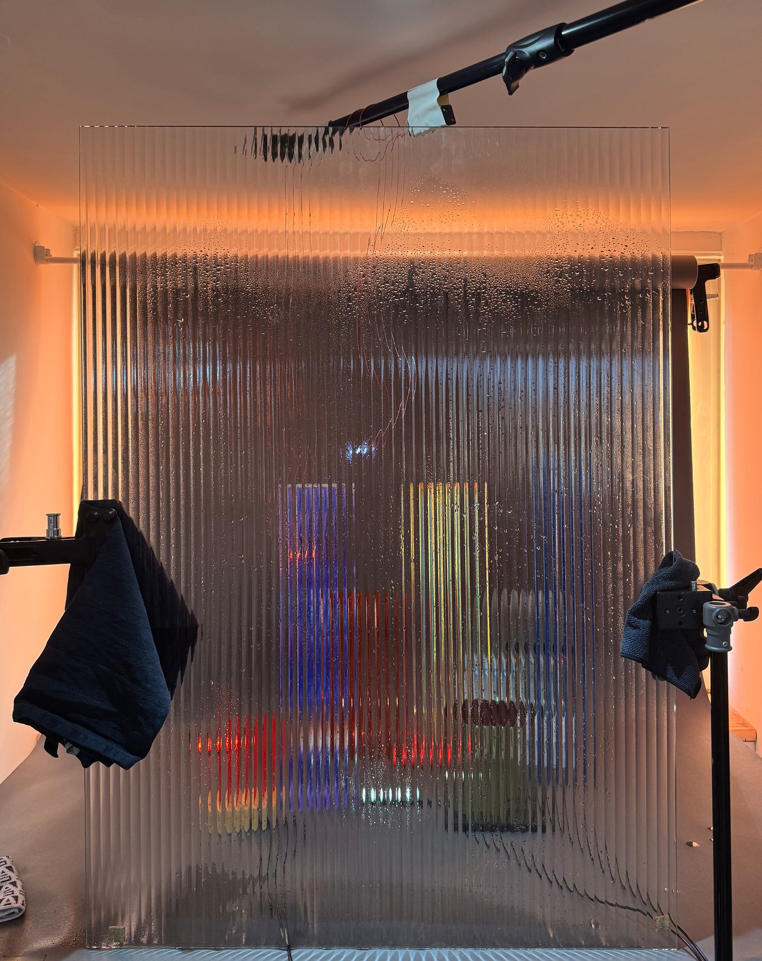 Behind-the-scenes studio image showing the fluted glass used to create the Diorama photographic series.